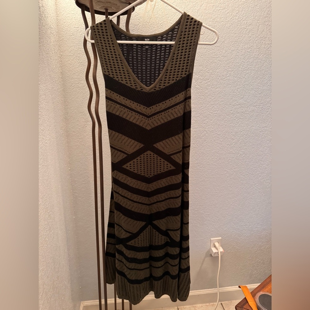 A green and black dress I’ve never worn, still w the tags on it.